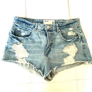 blue distressed denim shorts